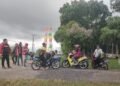 HUT OKUT Ke 22, Puluhan Wartawan Nyambi Jadi Juru Parkir Di Ajang Sriwijaya Open Race